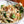 Laden Sie das Bild in den Galerie-Viewer, STEINER´s Low Carb High Protein Tagliatelle zubereitet mit Lachs und Spinat, getoppt mit STEINER´s Pasta Gewürz. Die Pasta ist in einem weißen tiefen Teller.