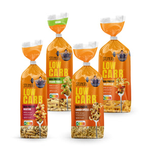 Vier Packungen STEINER´s Low Carb High Protein Pasta. Enthalten ist je eine Packung: vegane Fusilli, Rigatoni, Tagliatelle und Locken-Spätzle