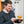 Laden Sie das Bild in den Galerie-Viewer, Der Olympiasieger im Gewichtheben betrachtet einen zubereiteten Burger aus STEINER´s Low Carb High Protein Burger Buns.