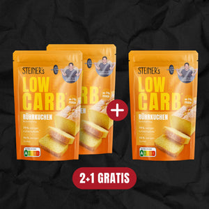 Drei Packungen STEINER´s Low Carb Rührkuchen. Auf einer Packung befindet sich ein Plus-Zeichen um zu signalisieren, dass es eine Packung gratis gibt.